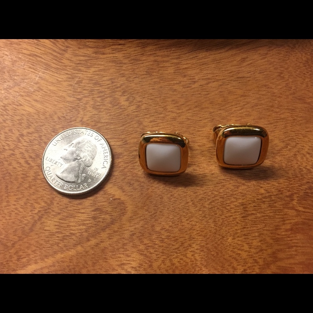 Vintage white and gold colored clip on earrings